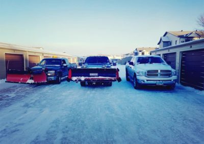 snow trucks - Father & Sons - Fargo, ND